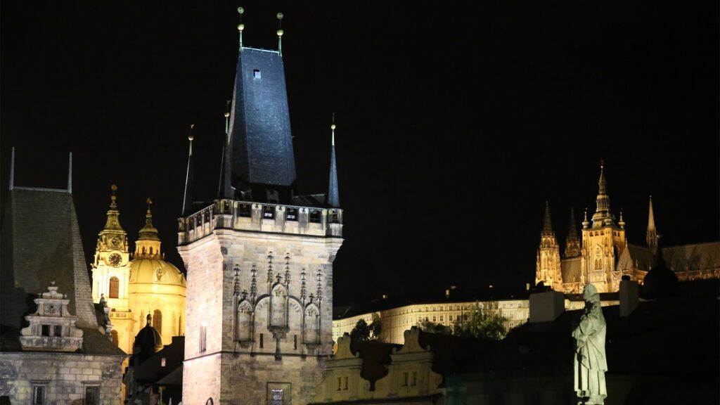 night towers of Charles Bridge with Prague castle